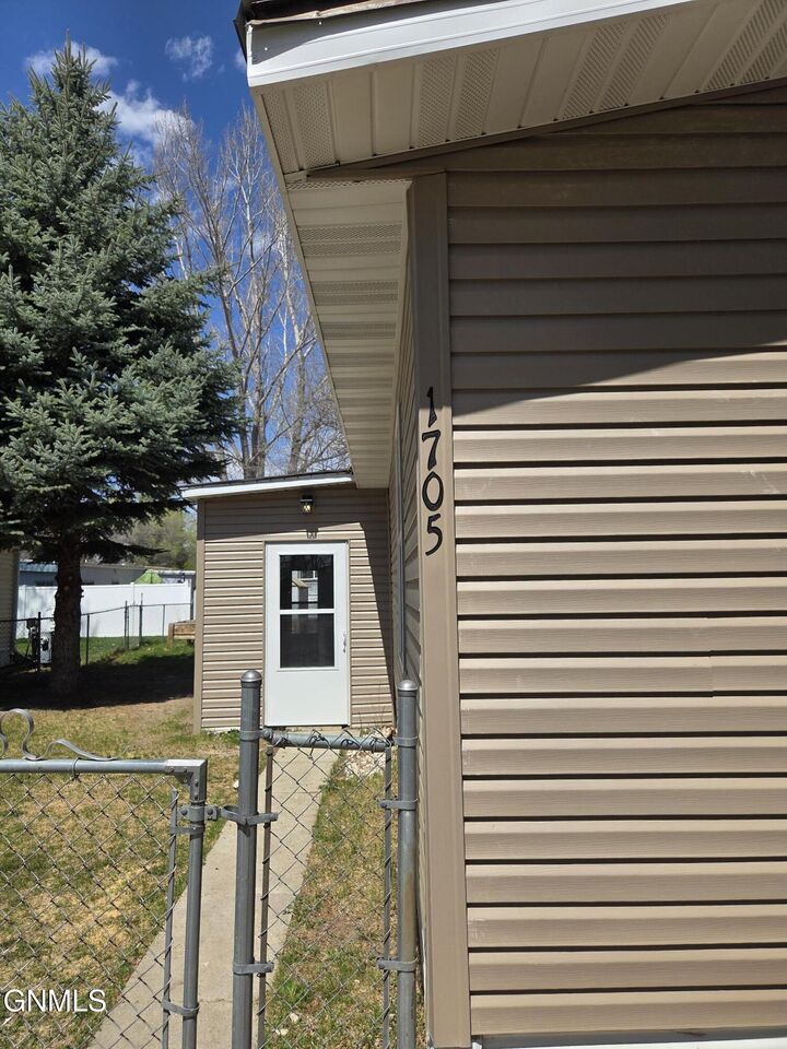 Property Photo:  1119 University Drive 1705  ND 58504 