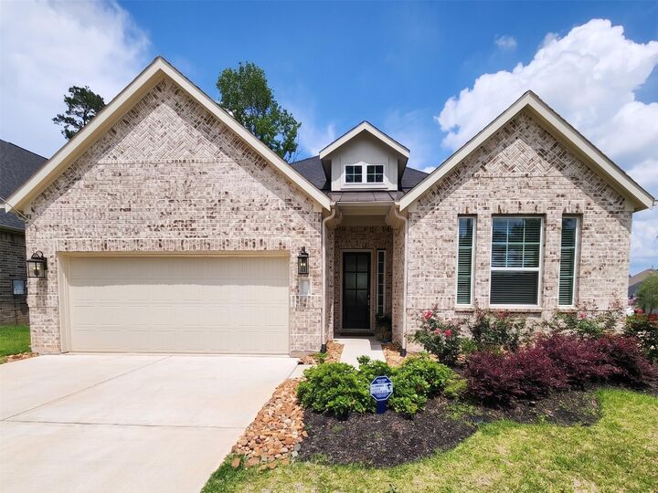 Property Photo:  204 Bronzewood Terrace Court  TX 77318 