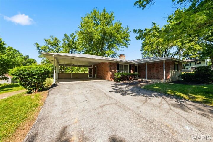 Property Photo:  13579 Old Jamestown Road  MO 63033 
