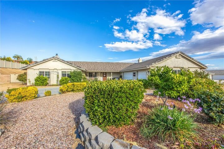 Property Photo:  13997 Riverside  CA 92307 