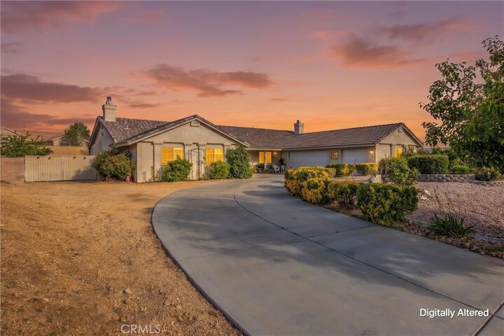 Property Photo:  13997 Riverside  CA 92307 