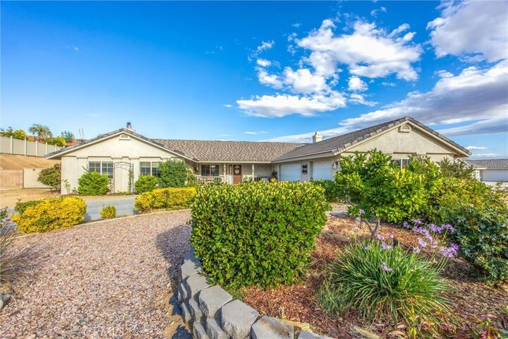 Property Photo:  13997 Riverside  CA 92307 
