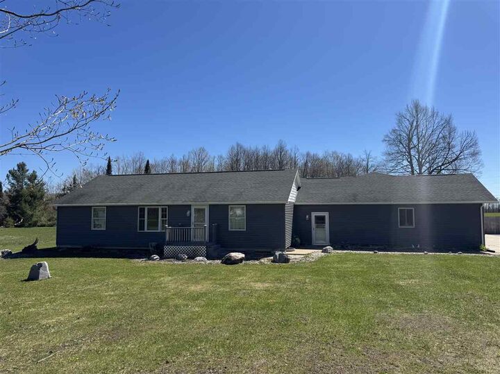Property Photo:  6690 N U.s. 31  MI 49755 