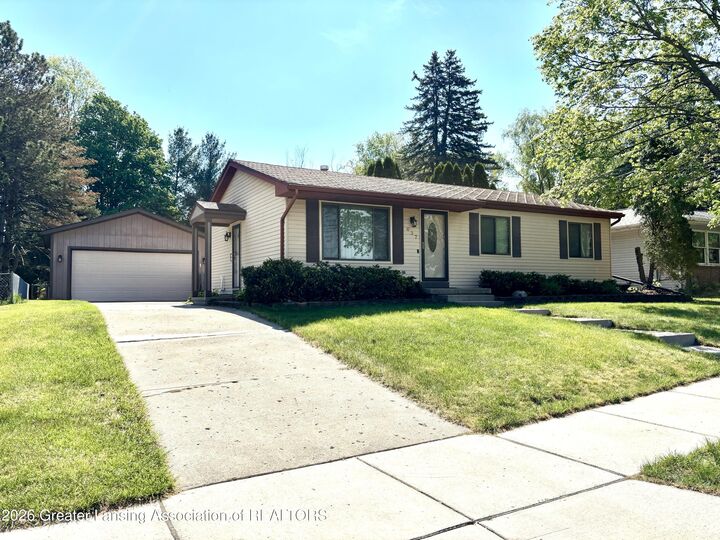 Property Photo:  637 Green Street  MI 48837 