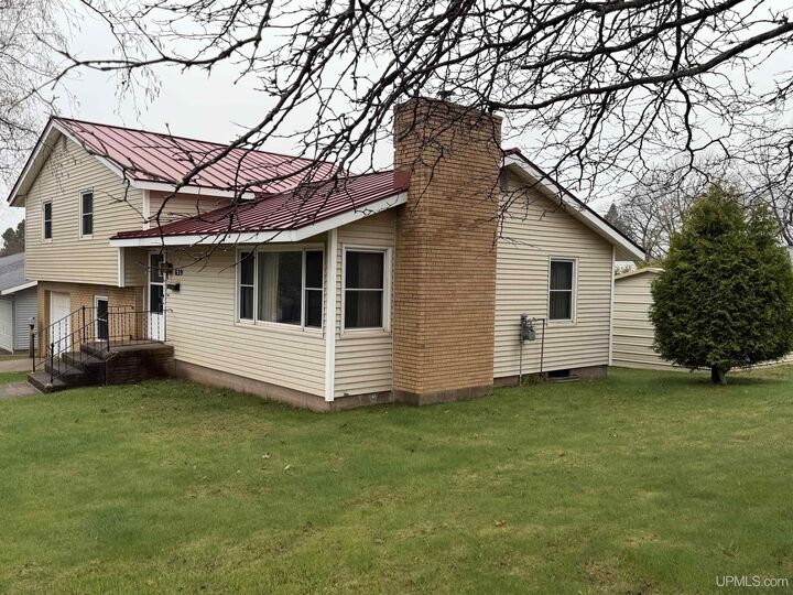 Property Photo: 639 Jopling Street MI 49849-1024