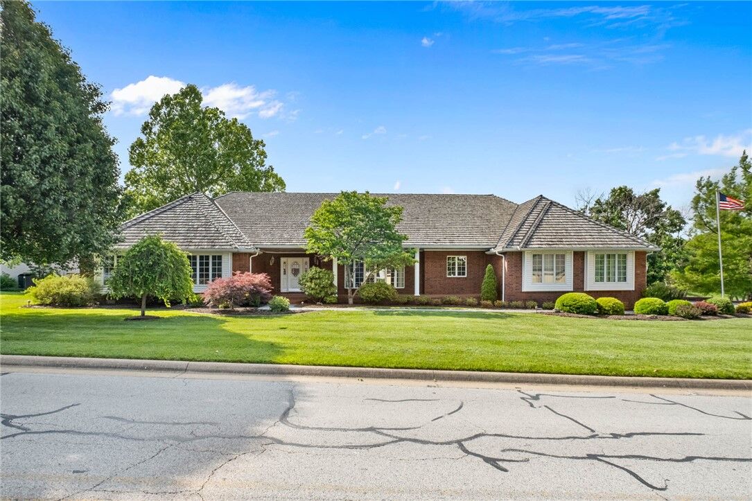 Property Photo:  18 W Champions Boulevard  AR 72758 