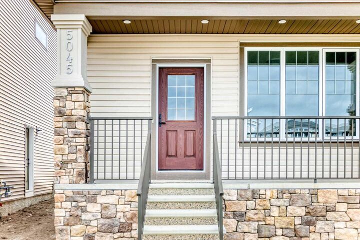 Property Photo:  5045 Harmony Circle  AB T3Z 0K5 
