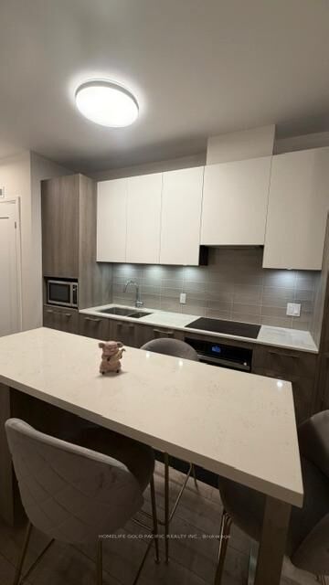 Property Photo: 38 Water Walk Drive 731 ON L3R 6M8