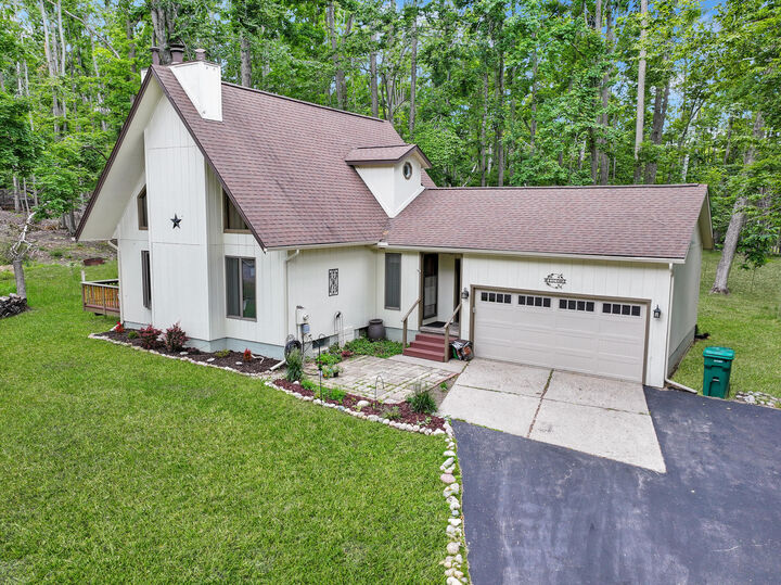 Property Photo:  944 Snowmoon Court  MI 49735 