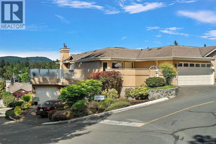 Property Photo:  6880 Wallace Drive 702  BC V8M 1N8 