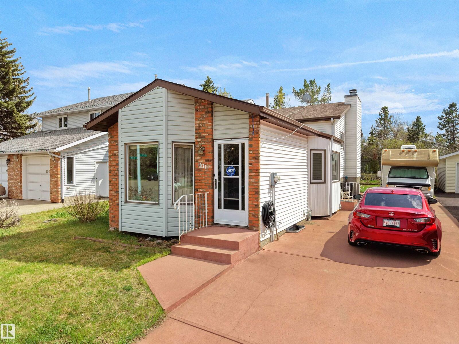 Property Photo:  10711 24 Avenue NW  AB T6J 5P9 