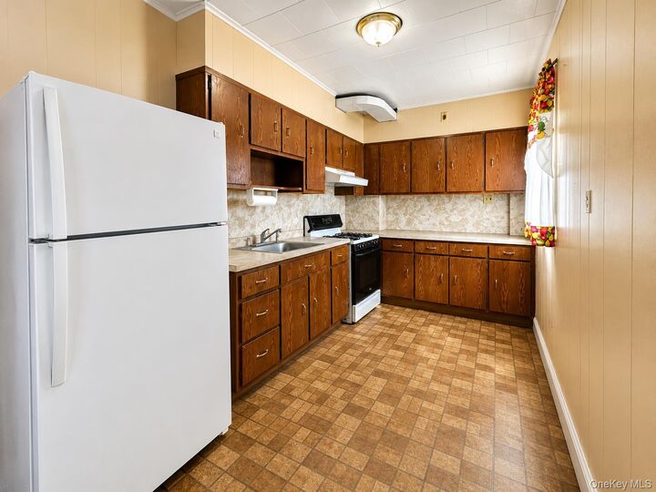 Property Photo:  89-46 210th Street  NY 11427 
