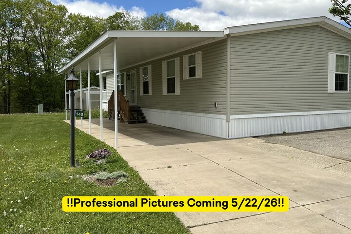 Property Photo:  140 Tamarack Avenue NE  MI 49319 