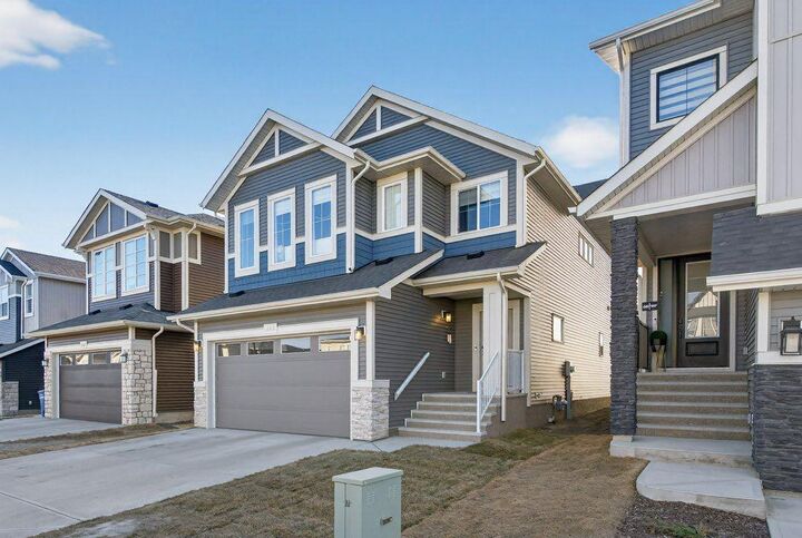 Property Photo:  665 Creekmill Court SW  AB T4B 5J8 