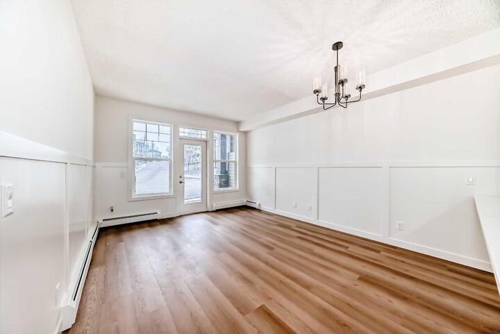Property Photo: 22 Panatella Road NW 101 AB T3K 0V4