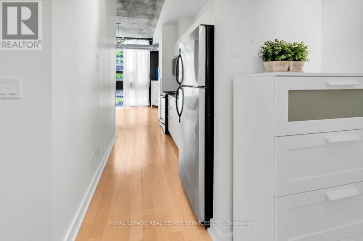 Property Photo: 60 Bathurst Street 210 ON M5V 2P7