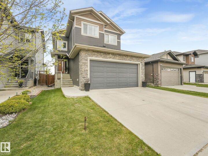 Property Photo:  12 Sandalwood Place  AB T9E 1C2 