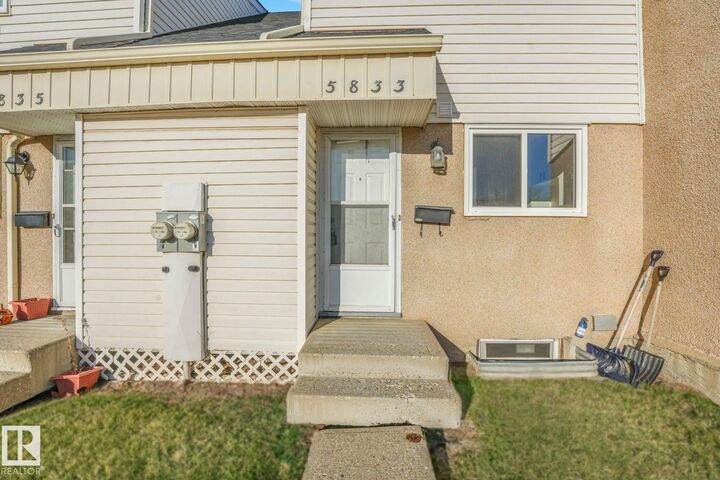Property Photo: 5833 Riverbend Road NW AB T6H 5A8