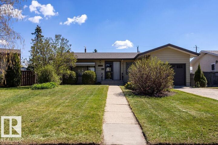 Property Photo:  13515 129 Street NW  AB T5L 1K4 