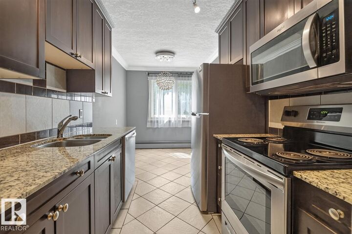 Property Photo: 10625 83 Avenue NW 402 AB T6E 2E3