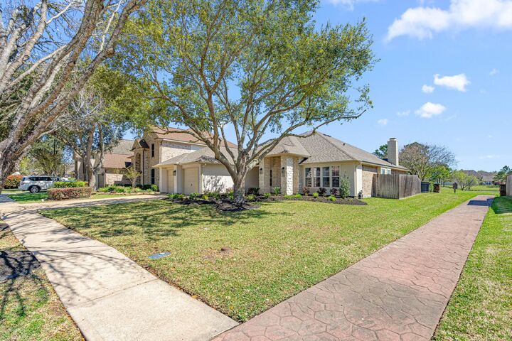 Property Photo: 1489 Garden Lakes Drive TX 77546