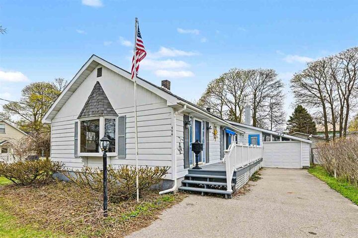 Property Photo:  404 May  MI 49720 