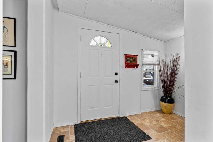 Property Photo:  117 Sunset Way  AB T1V 1J4 