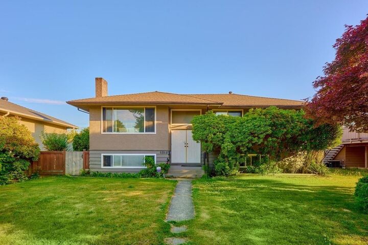 Property Photo:  6568 E Georgia Street Upper  BC V5B 1V8 