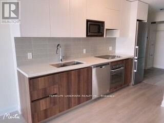 Property Photo: 15 Water Walk Drive 1101 ON L3P 1N3