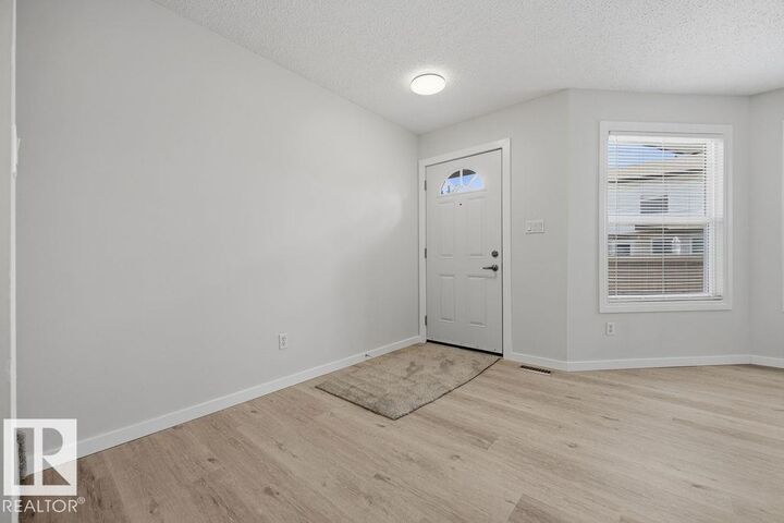 Property Photo: 10473 24 Avenue NW AB T6J 4S2