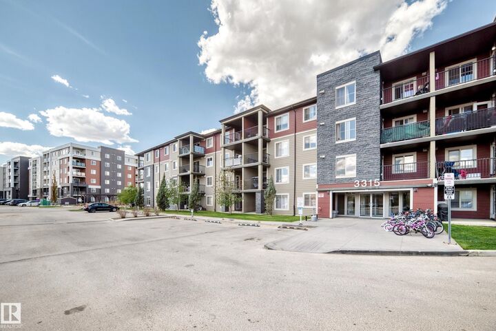 Property Photo: 3315 James Mowatt Trail SW 210 AB T6W 3L9