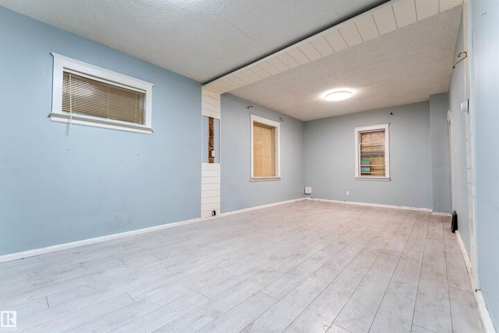 Property Photo: 11608 93 Street NW AB T5G 1C9