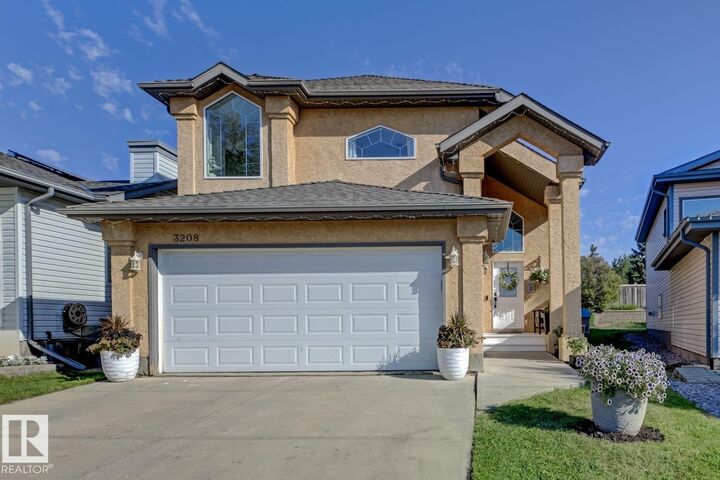 Property Photo:  3208 135A Avenue NW  AB T5A 5E3 