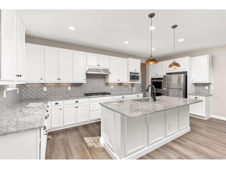 Property Photo:  5815 Boston Ct  CO 80238 