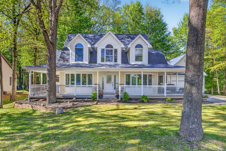 Property Photo:  6908 Club House Drive E  MI 49346 