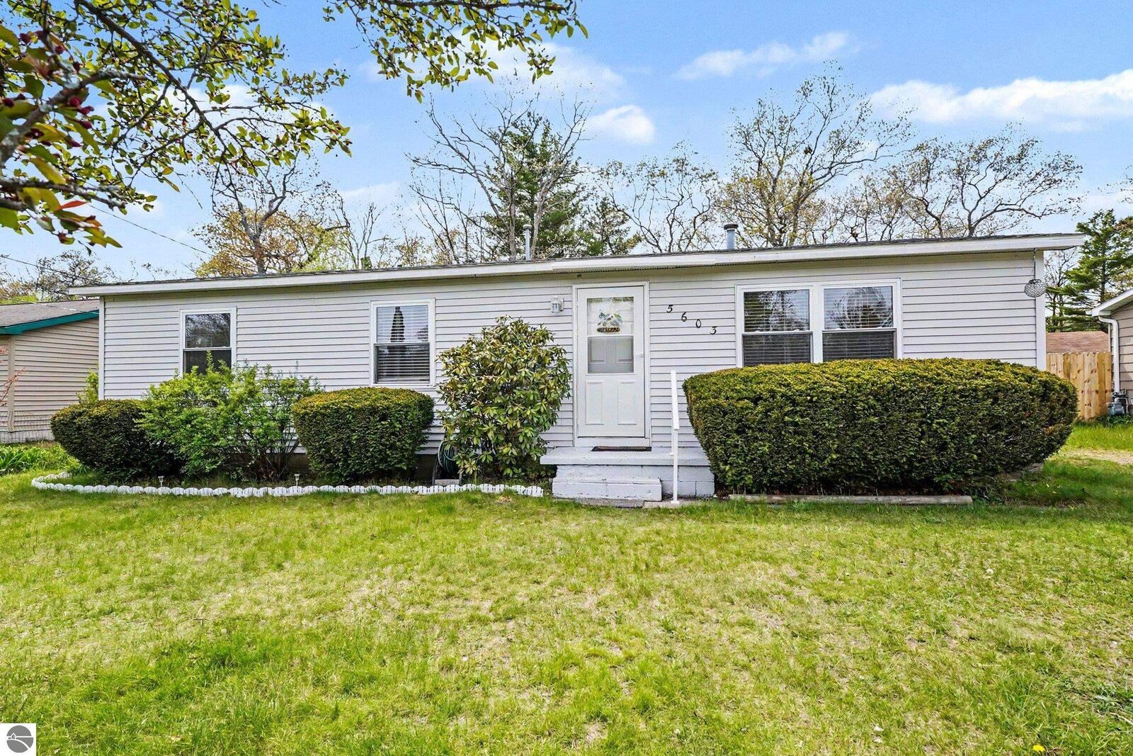 Property Photo:  5603 Cedar Lake Road  MI 48750 