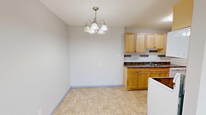 Property Photo: 401 Columbia Boulevard W 308 AB T1K 4R6