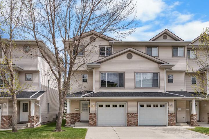 33 Country Hills Cove NW — photo 1
