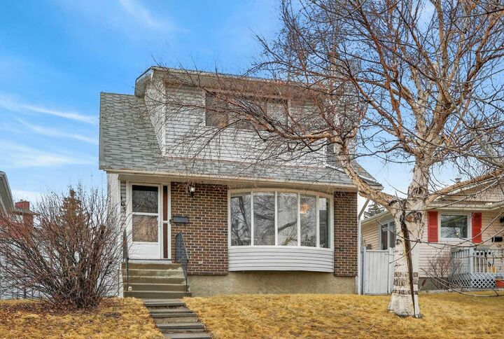 Property Photo: 103 Macewan Drive NW AB T3K 2G2