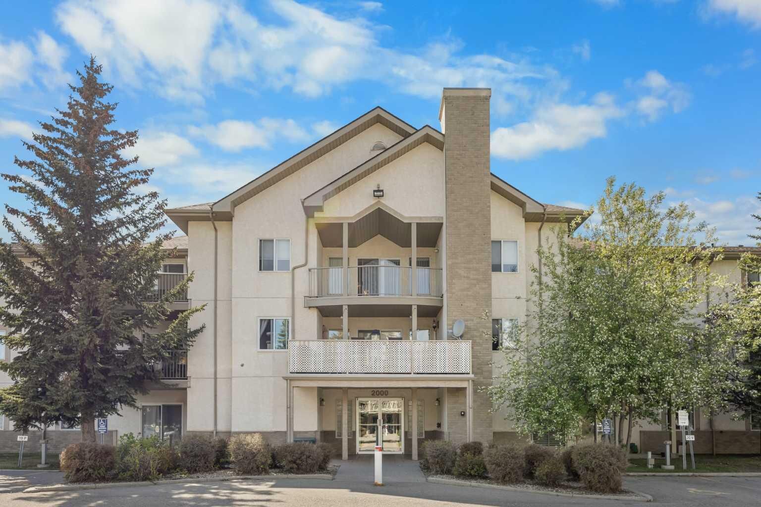 Property Photo:  20 Harvest Rose Park NE 2106  AB T3K 4Z1 