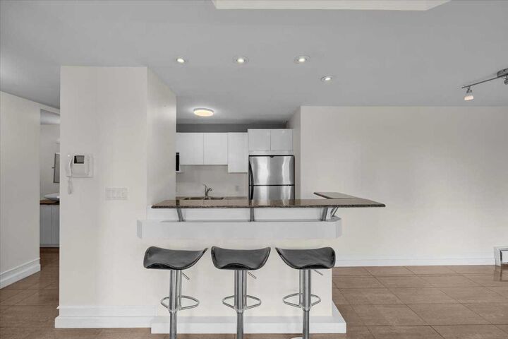 Property Photo:  706 15 Avenue SW 704  AB T2R 0R7 