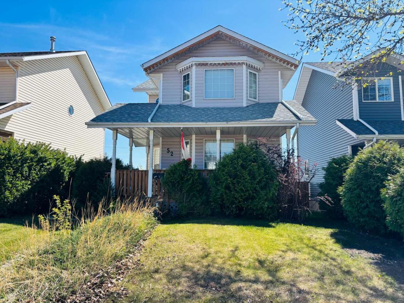 Property Photo: 52 Country Ridge Close AB T4L 1H2