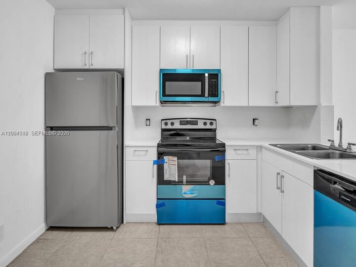 Property Photo:  241 NW 40th St 1-6  FL 33309 