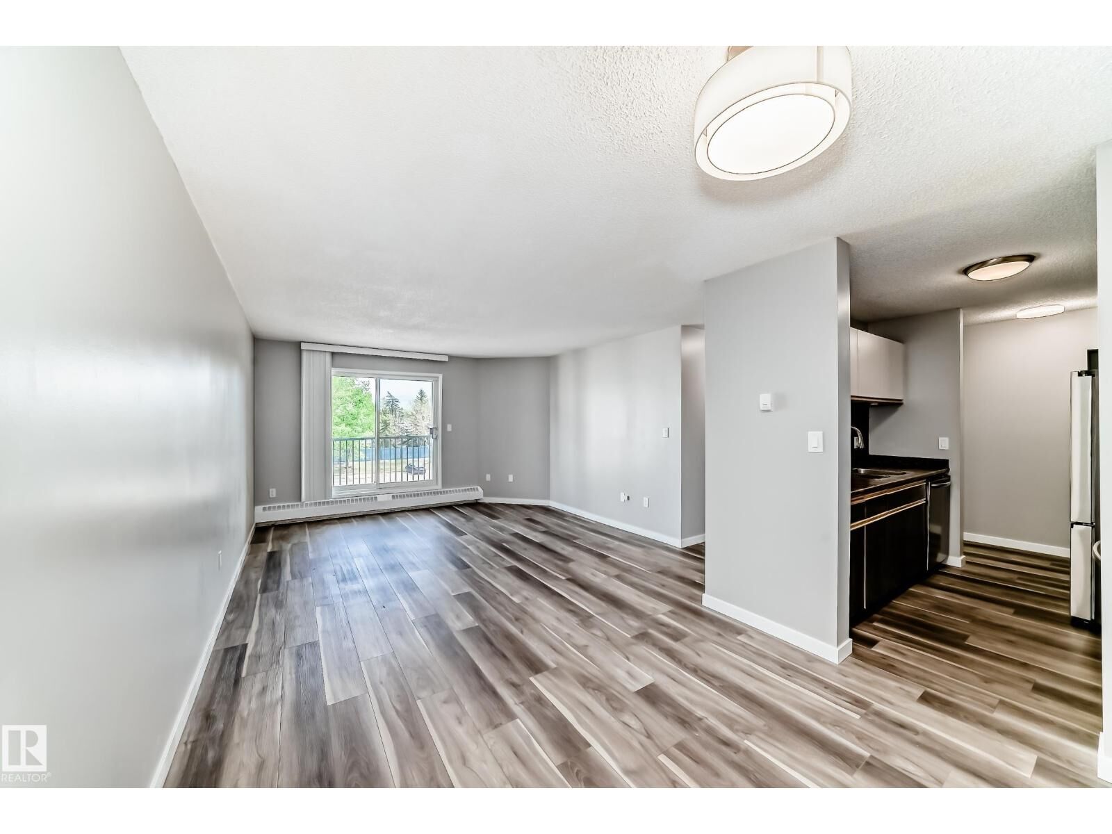Property Photo:  #306 2508 50 St NW  AB T6L 6X9 
