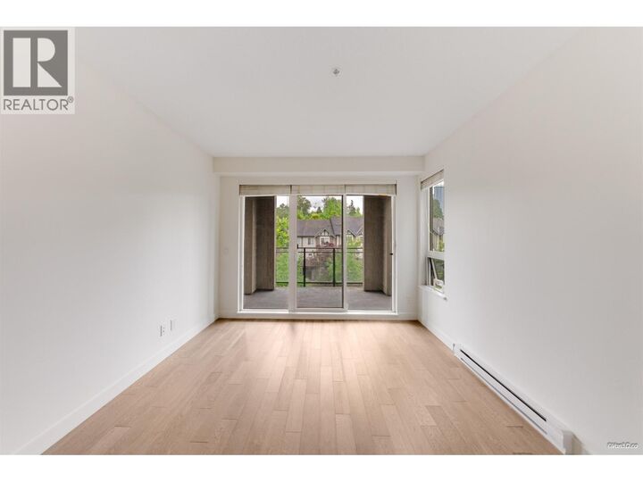 Property Photo: 3399 Noel Drive 411 BC V3J 0G8