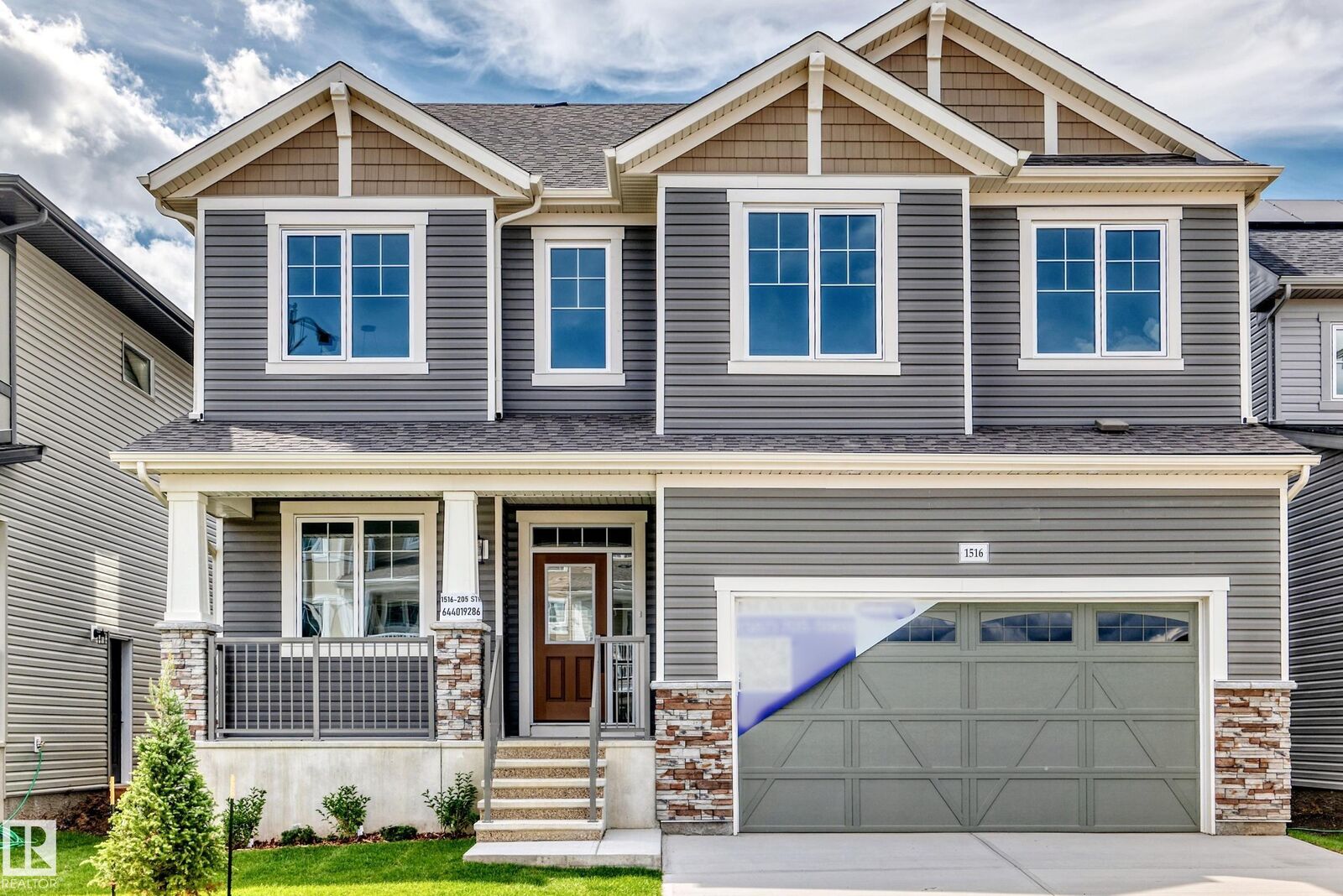 Property Photo: 1516 205 Street NW AB T6M 3E7
