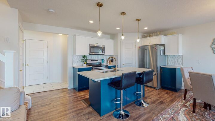 Property Photo:  6859 Evans Wynd NW  AB T6M 0T6 