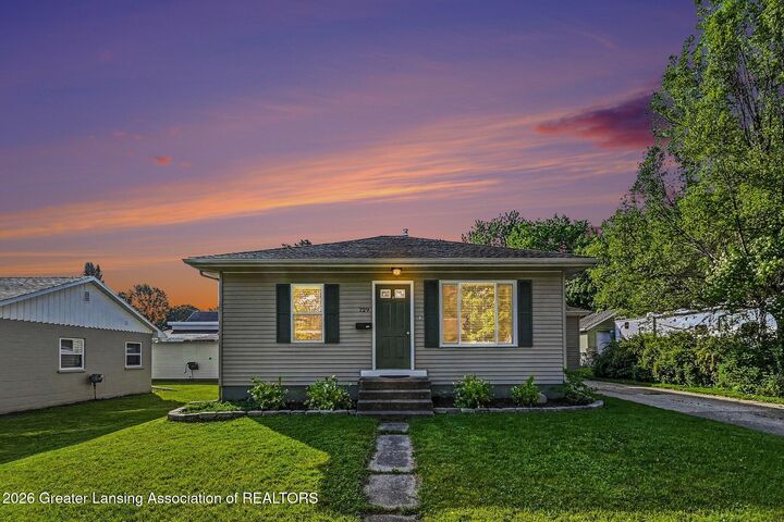 Property Photo: 729 Riverside Drive MI 48875