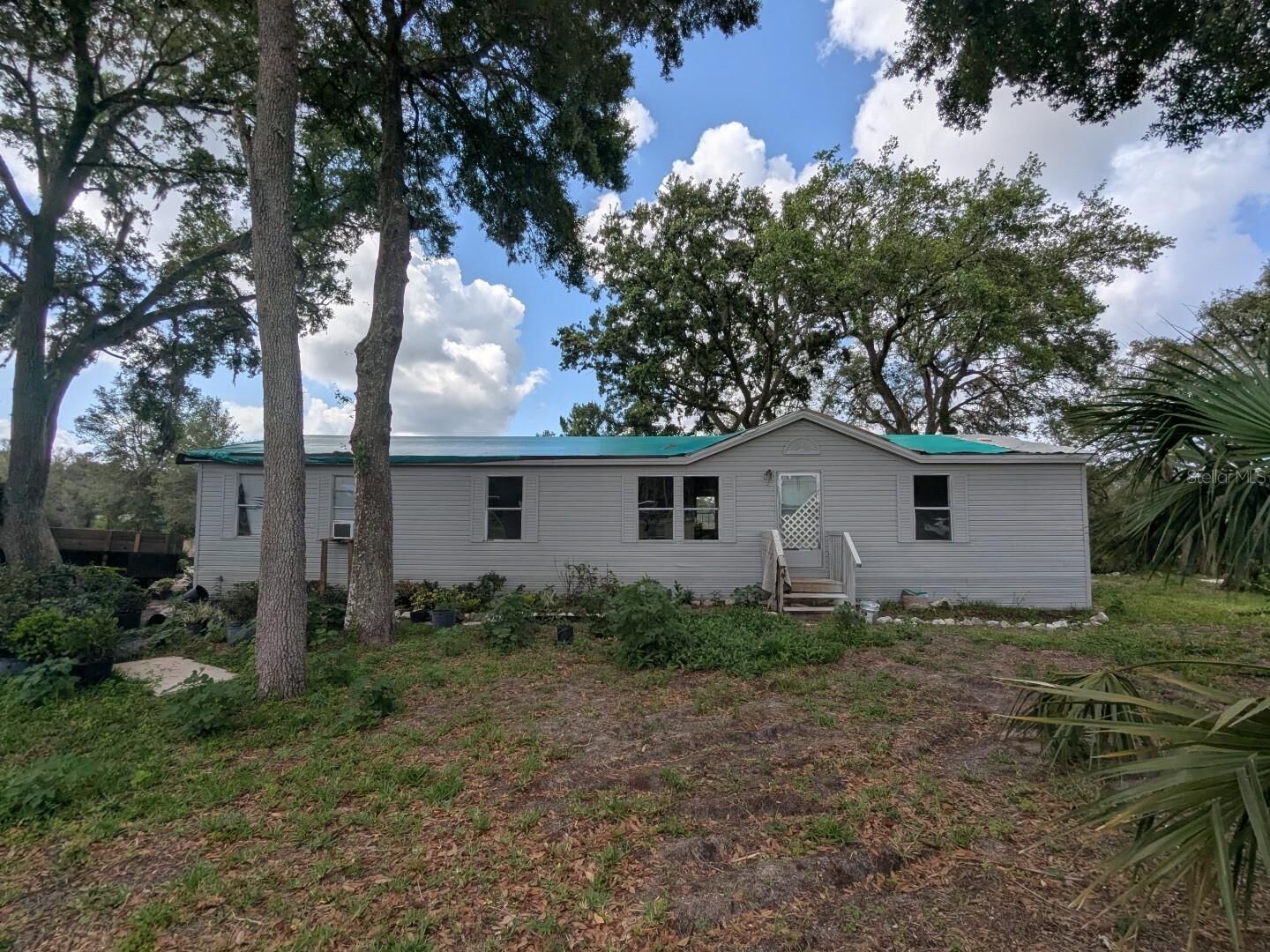 Property Photo:  12406 Hudson Avenue  FL 34669 