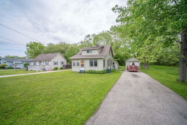 Property Photo:  7180 N River Rd  WI 53090 